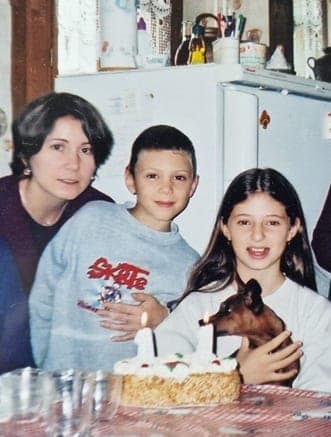 Our mom with my brother and me as children